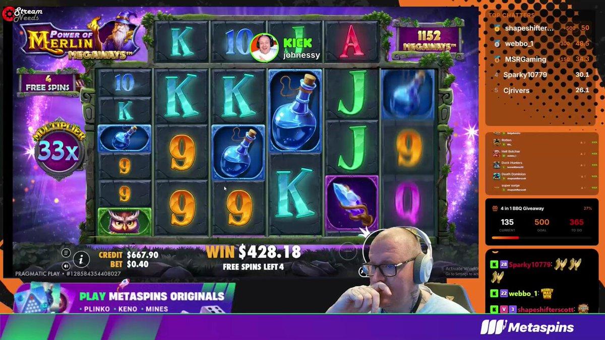 Video of streamer johnessyslots reacting to a $1.4K hit on Power of Merlin.